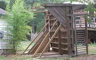 Largest part of climbing structure even with garage